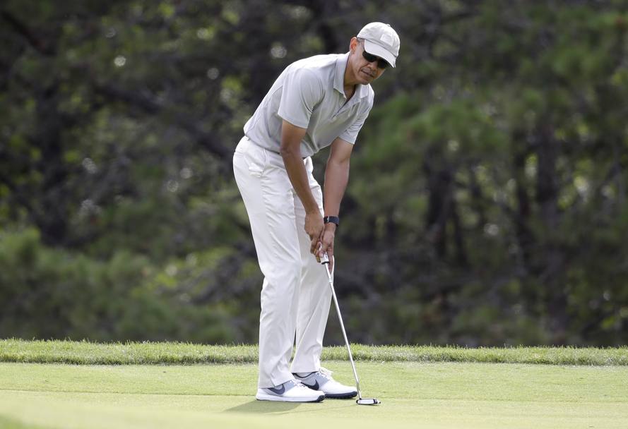 Un primo piano su Barack Obama: la sua passione per il golf  cosa nota. AP